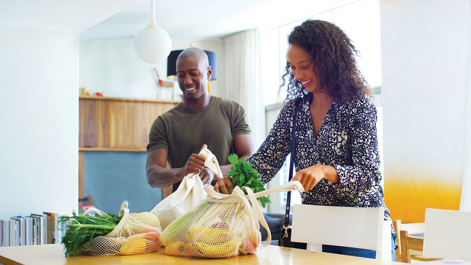 people bringing home groceries